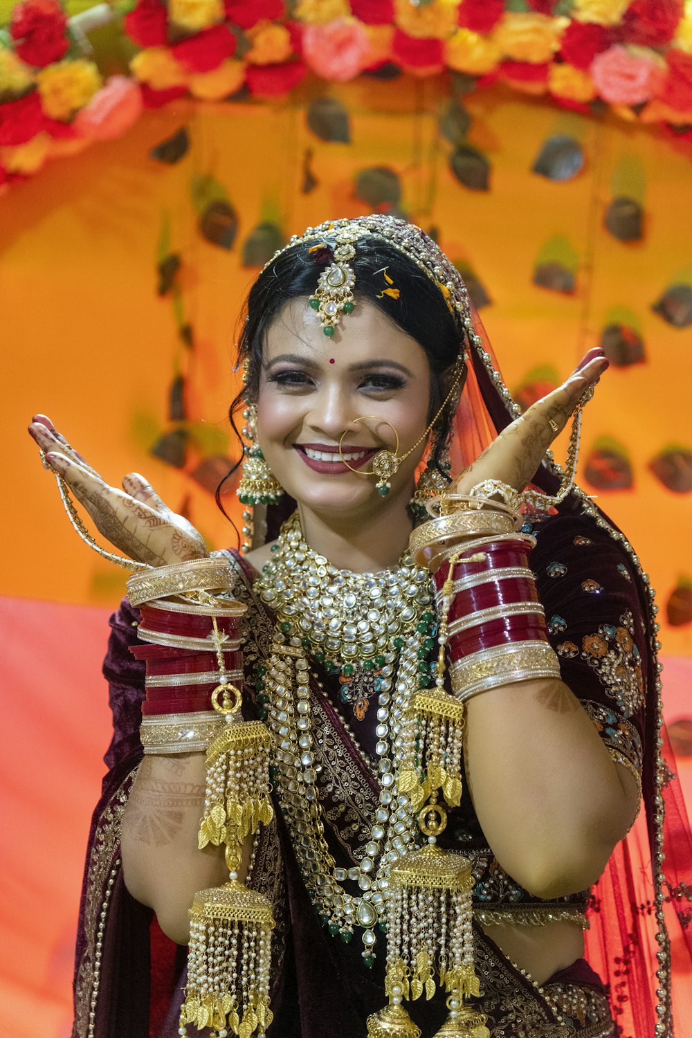 a woman dressed in a traditional indian costume