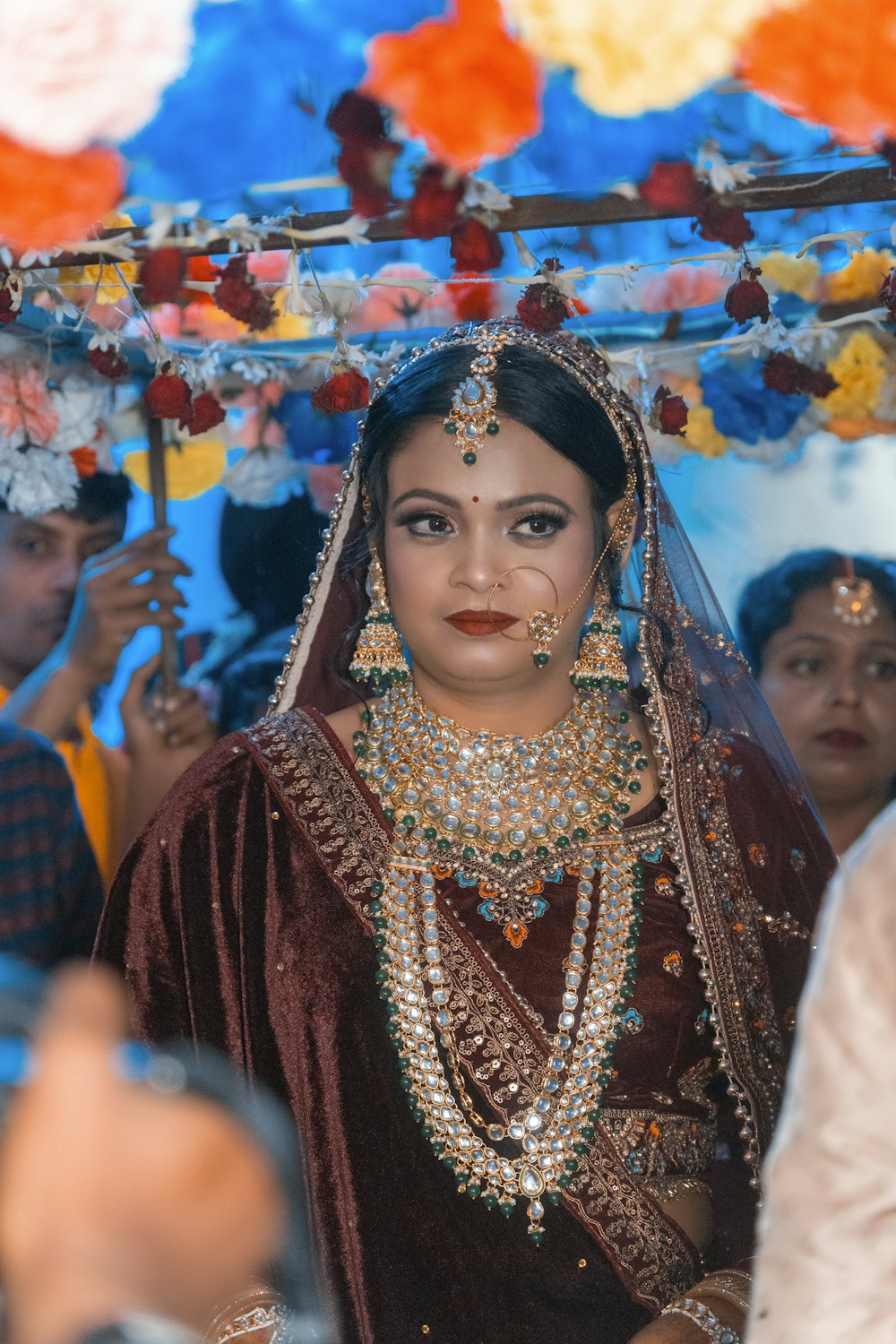 a woman dressed in a bridal outfit