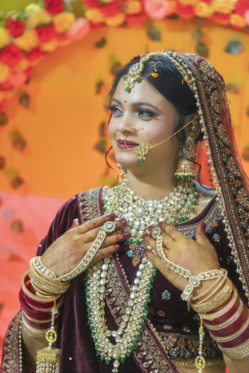 a woman dressed in a traditional indian costume