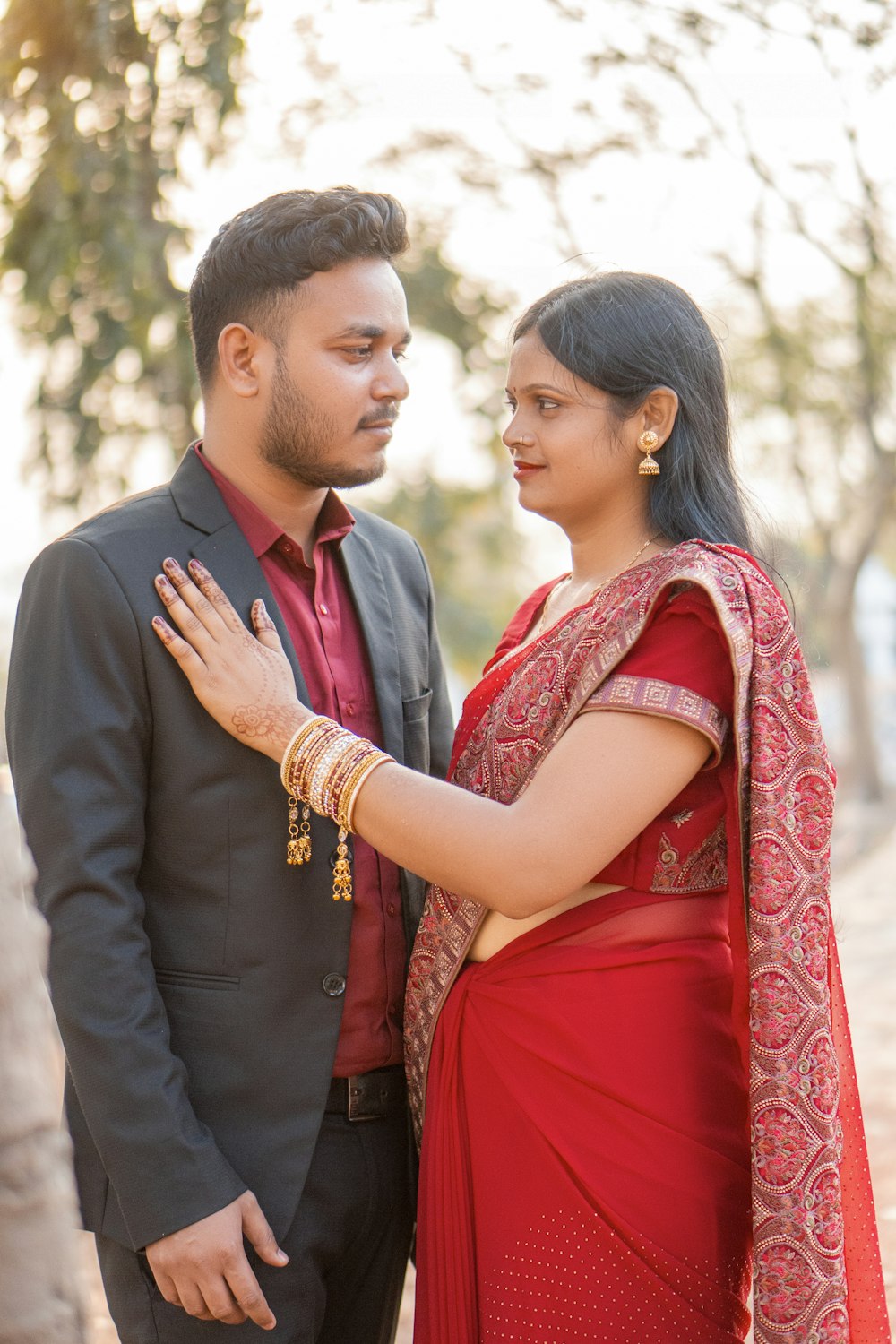 a man and a woman standing next to each other