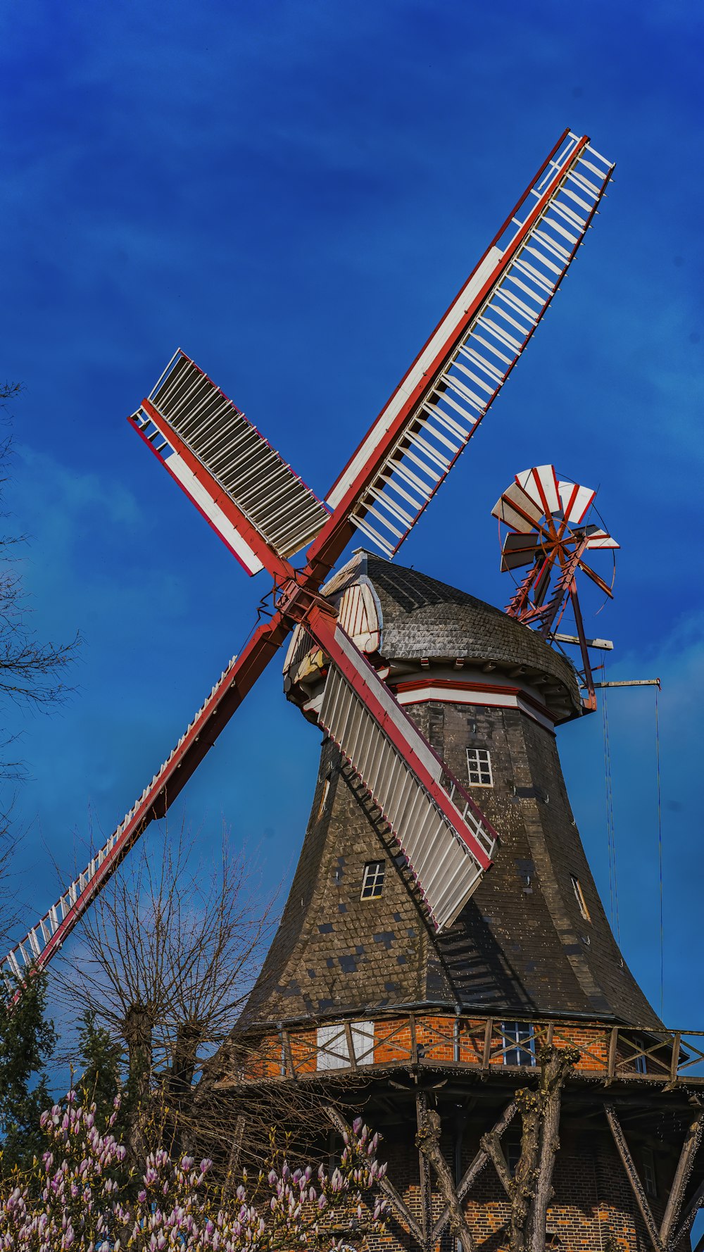 a windmill with a red, white and blue design on it