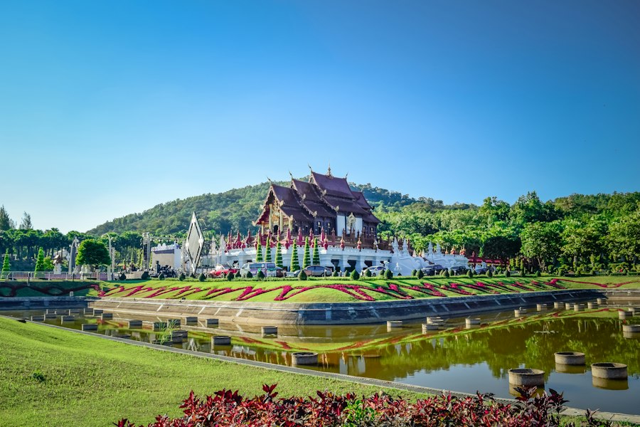 Temple building on a green field in Chiang Mai
