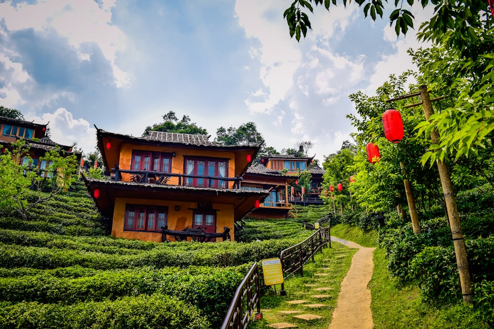 a house on a hill with a path leading to it