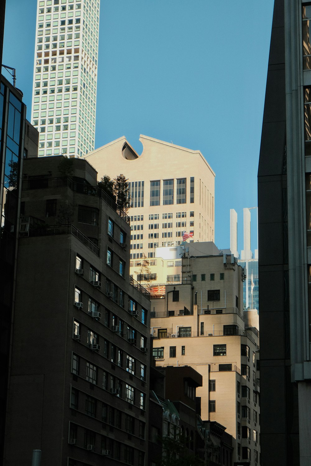 a view of a city with tall buildings