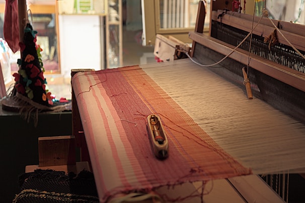 a close up of an old weaving machine