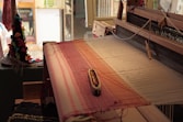 a close up of an old weaving machine