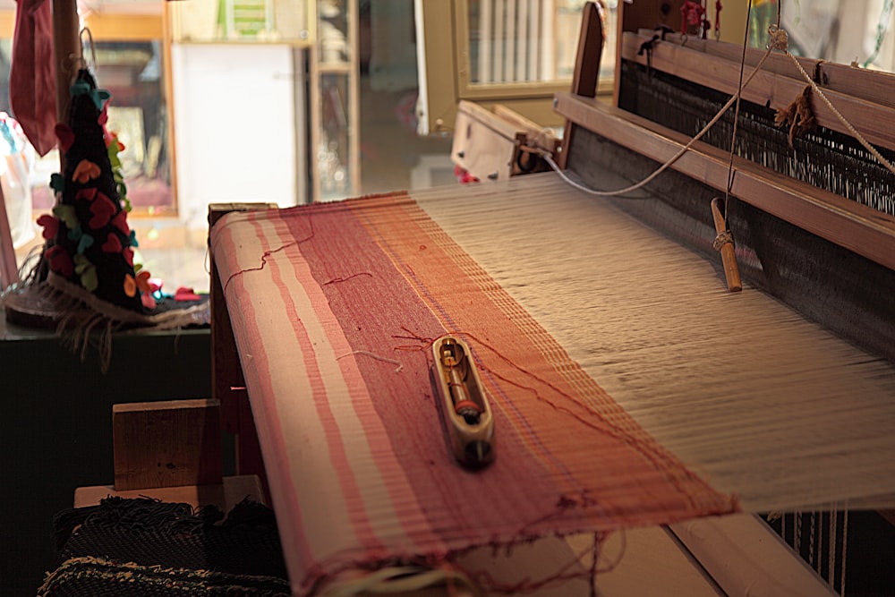 a close up of an old weaving machine