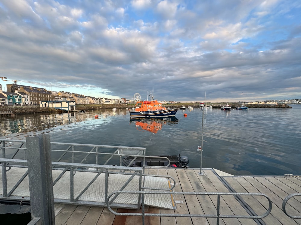 a dock with a boat in the water