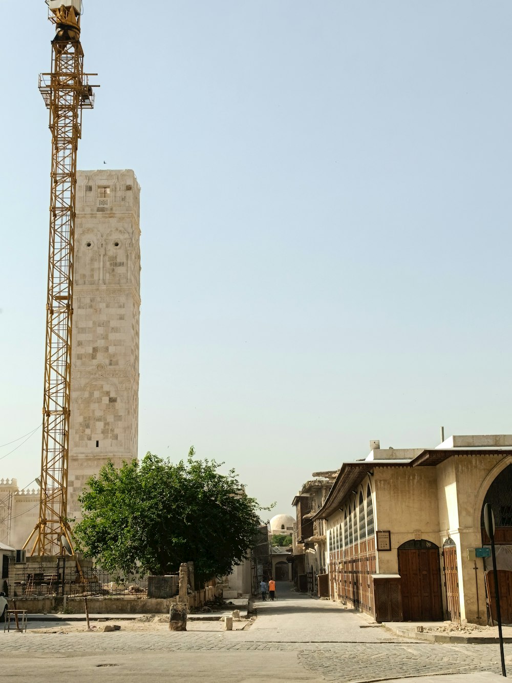 a tall tower with a clock on top of it