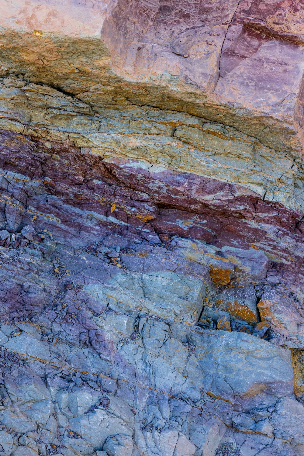 a bird is perched on a rock formation