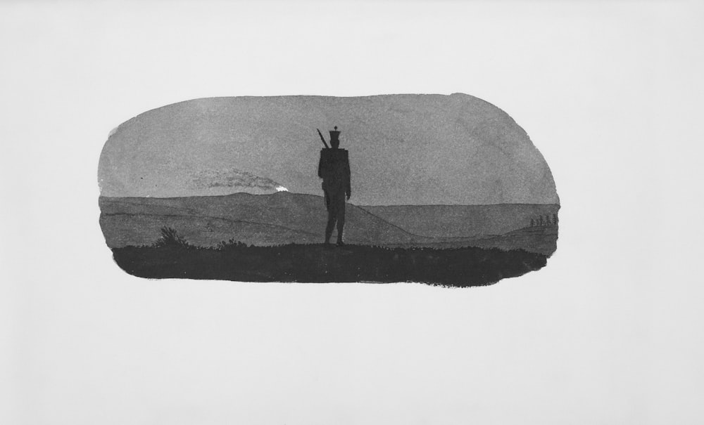 a black and white drawing of a man standing on a hill