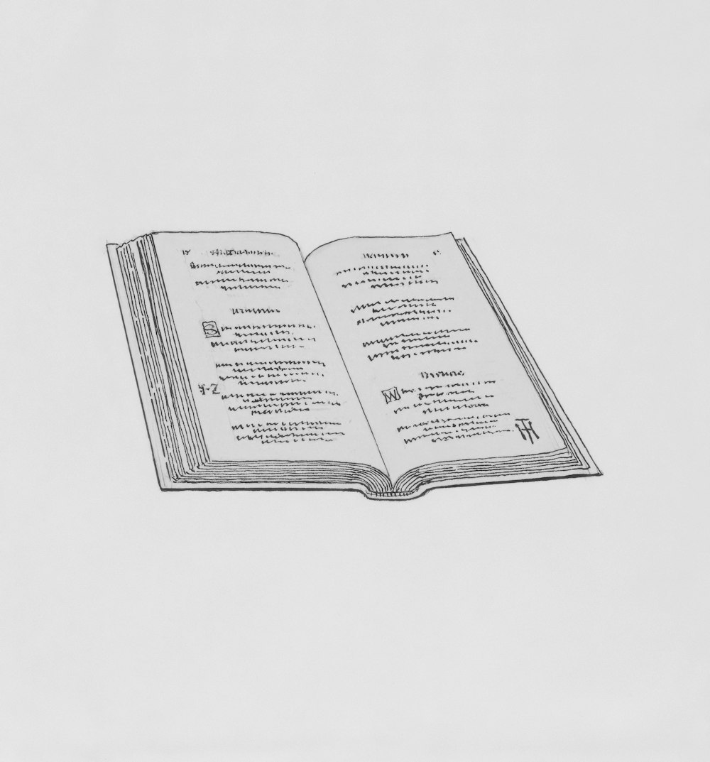 a drawing of an open book on a table