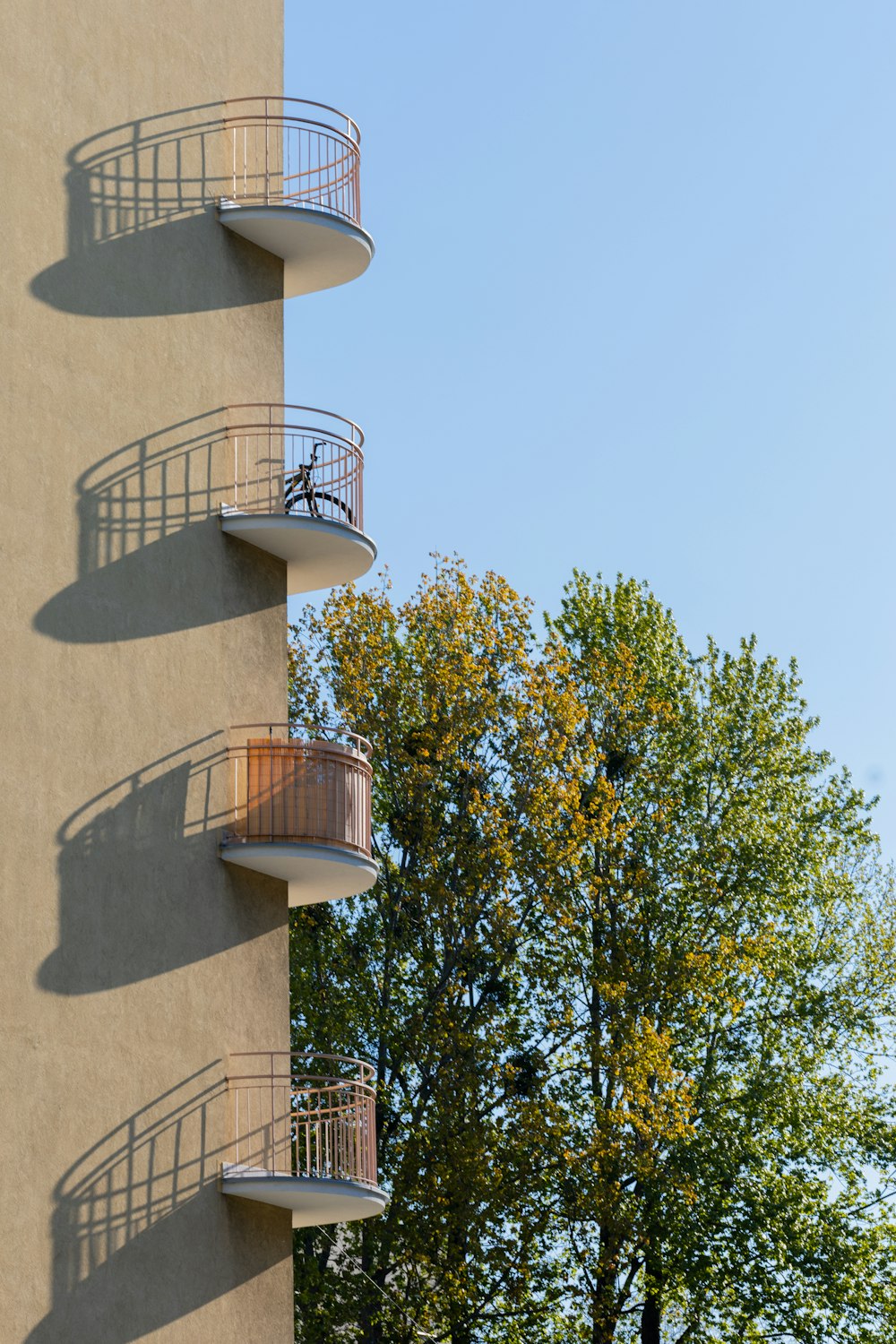 a tall building with balconies and balconies on the balconies