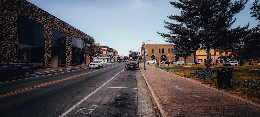 a street with cars parked on both sides of it