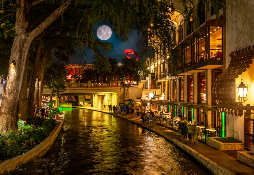 a river running through a city at night