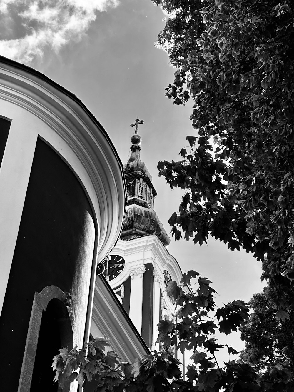 a black and white photo of a clock tower