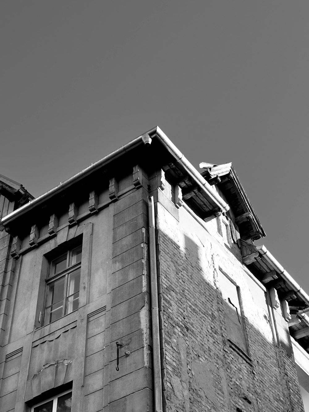 a black and white photo of an old building