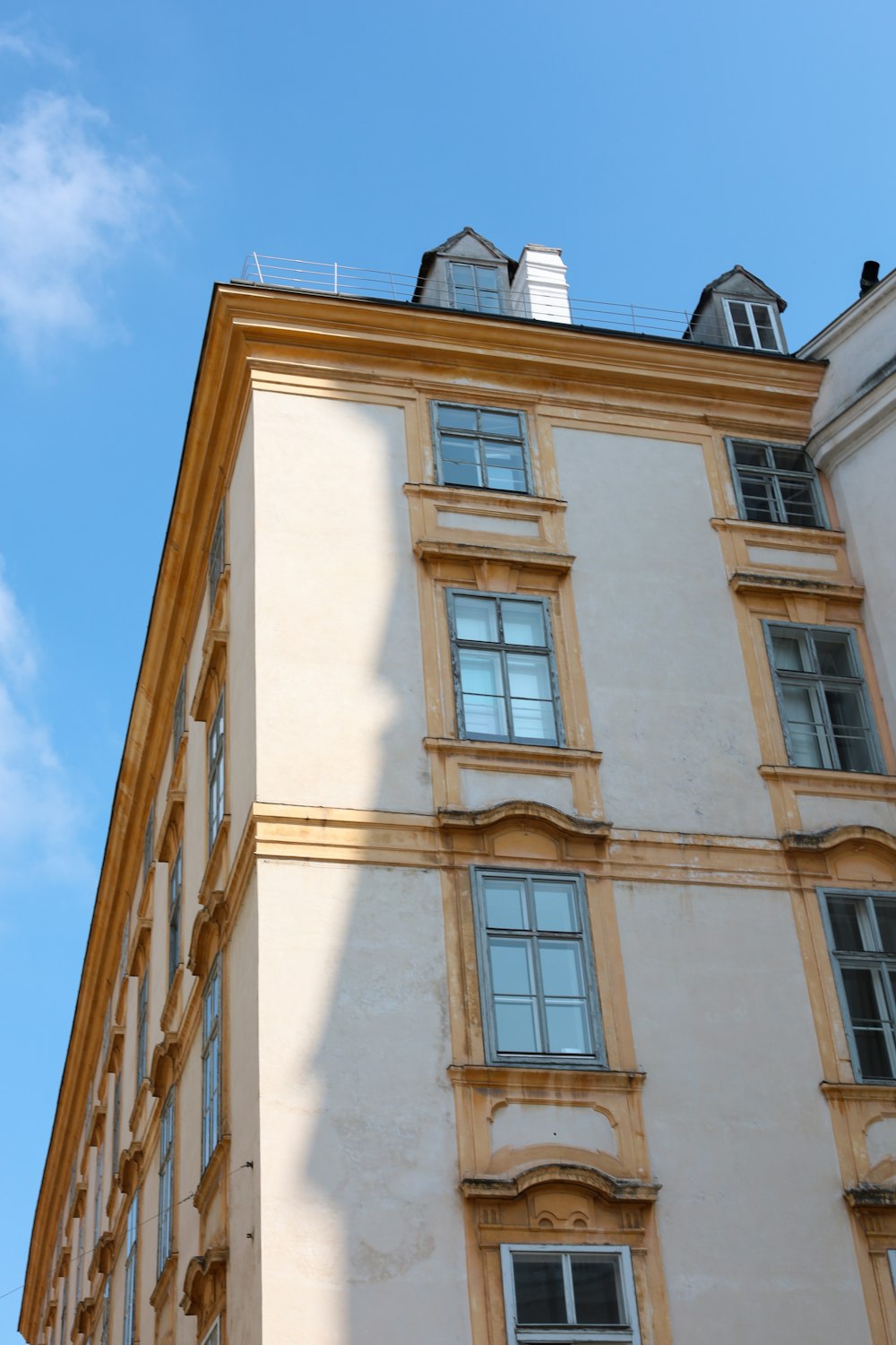 a tall building with a clock on the top of it