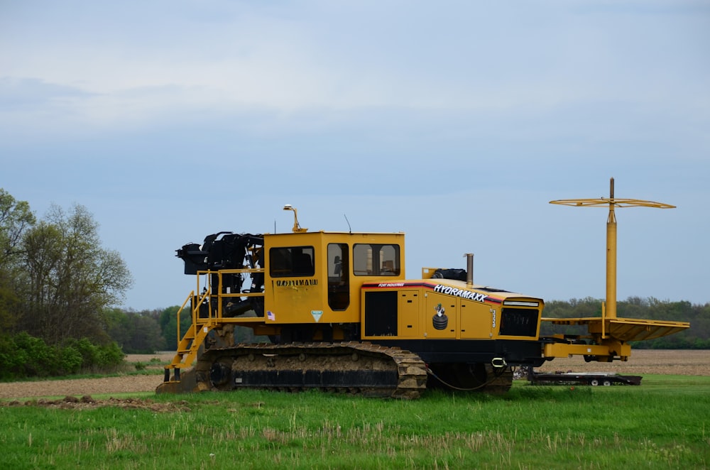 a tractor is parked in the middle of a field