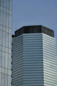 a tall building with a clock on the top of it