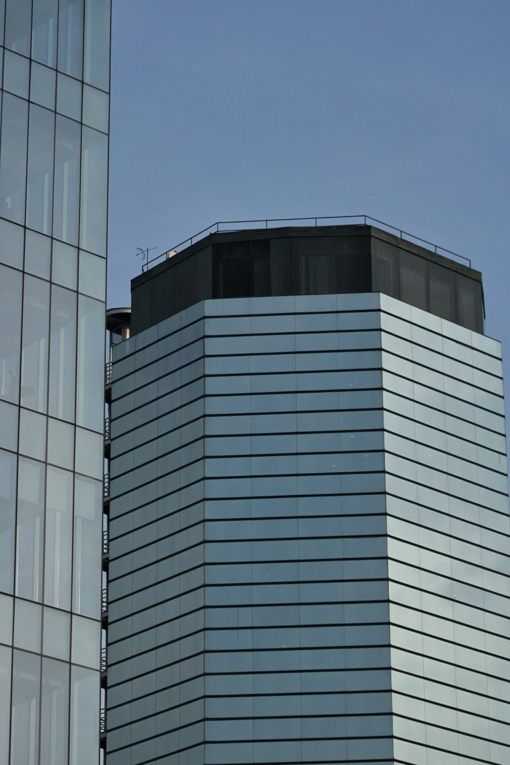 a tall building with a clock on the top of it