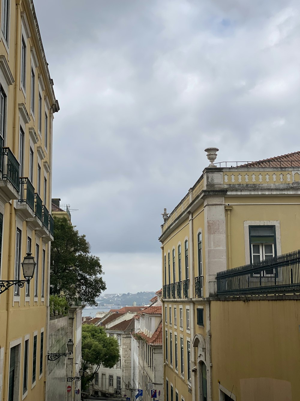 a narrow street with buildings on both sides