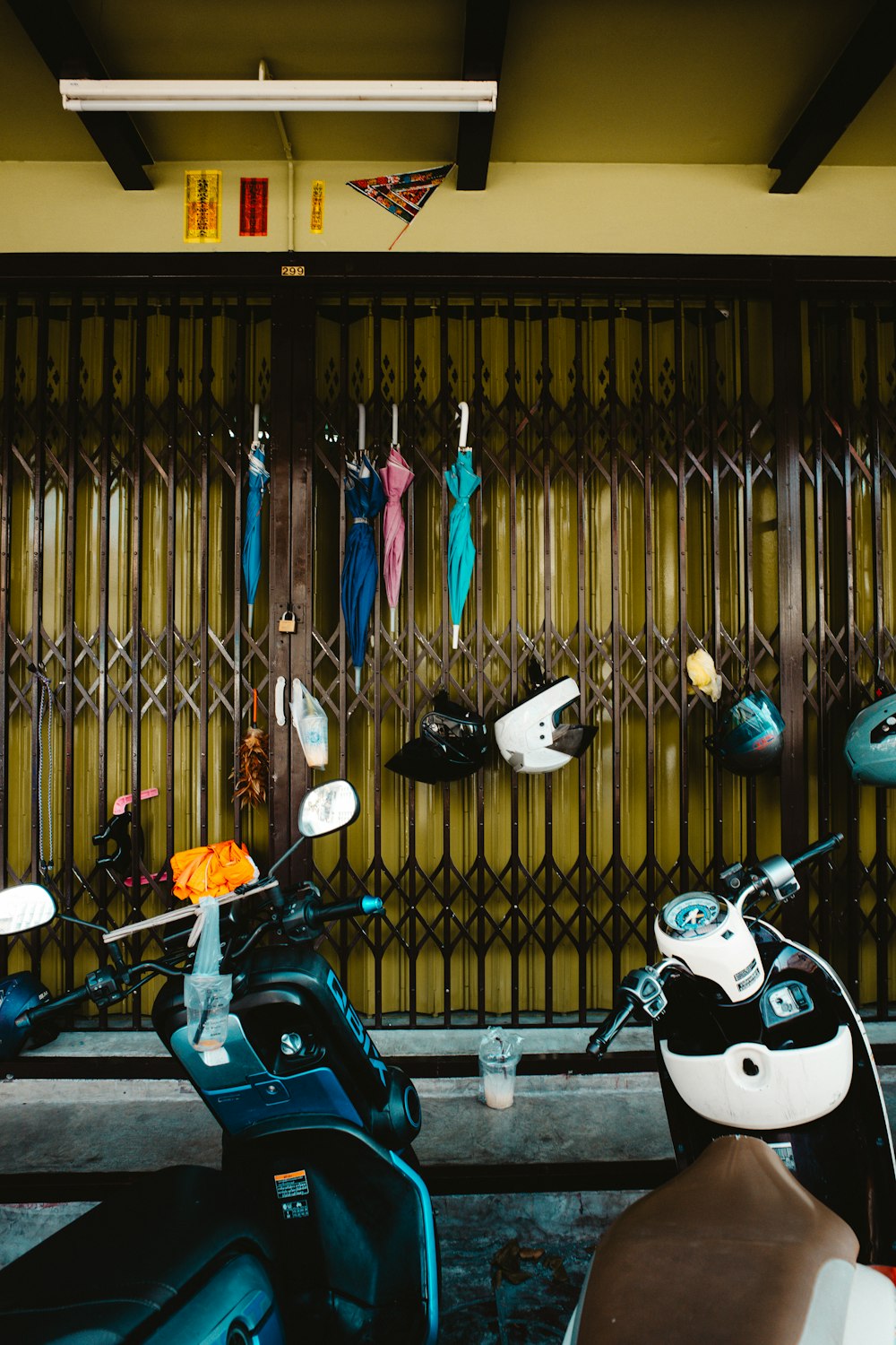 a couple of scooters parked next to each other