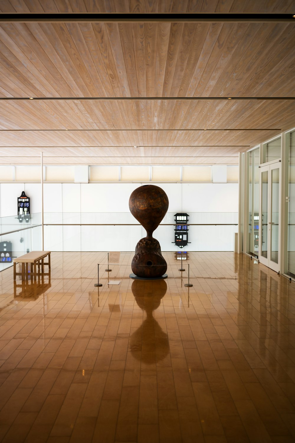 a large room with a sculpture in the middle of it