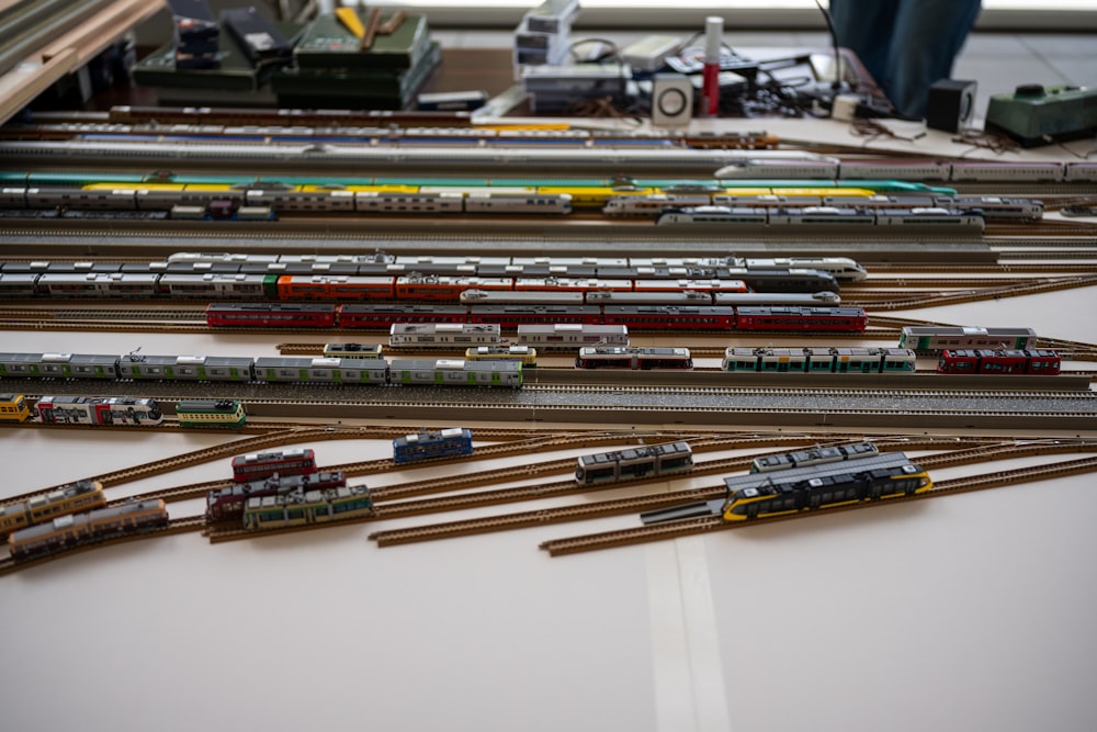 a bunch of trains that are sitting on a table