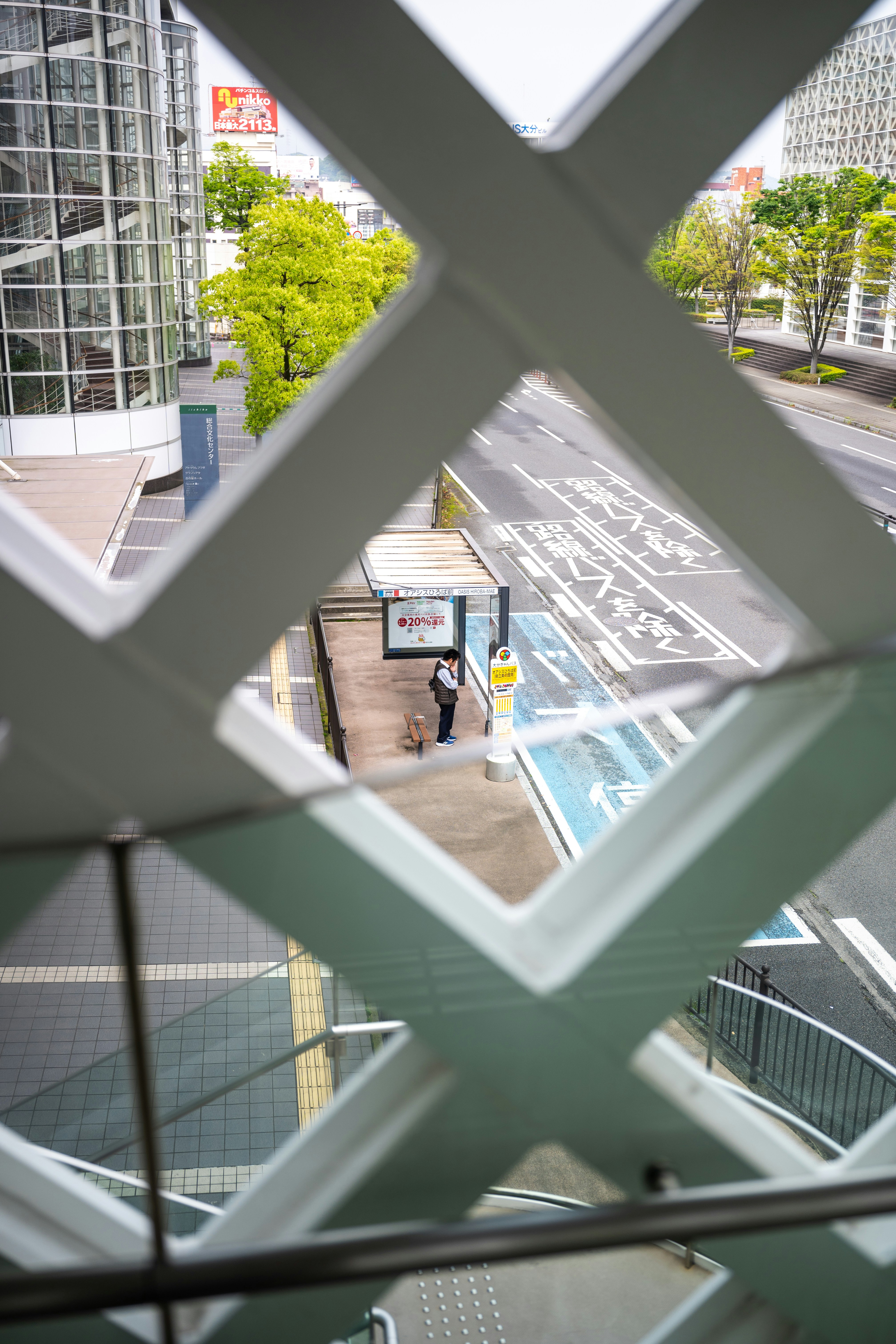 A view of a street through a window photo – Free Building Image on Unsplash