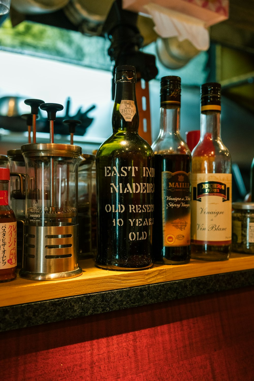 bottles of liquor are sitting on a counter