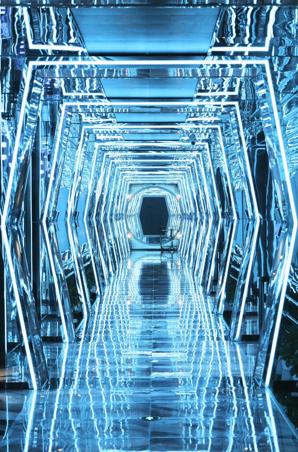 a very long tunnel that has a lot of lights on it