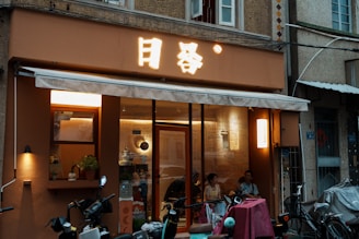 a store front with bicycles parked in front of it