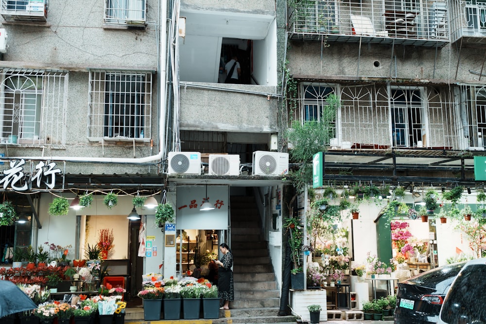 a building that has a bunch of flowers on it