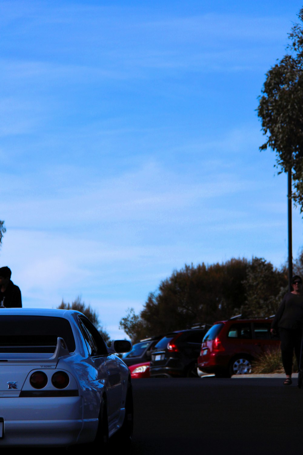 a person riding a skateboard on a city street