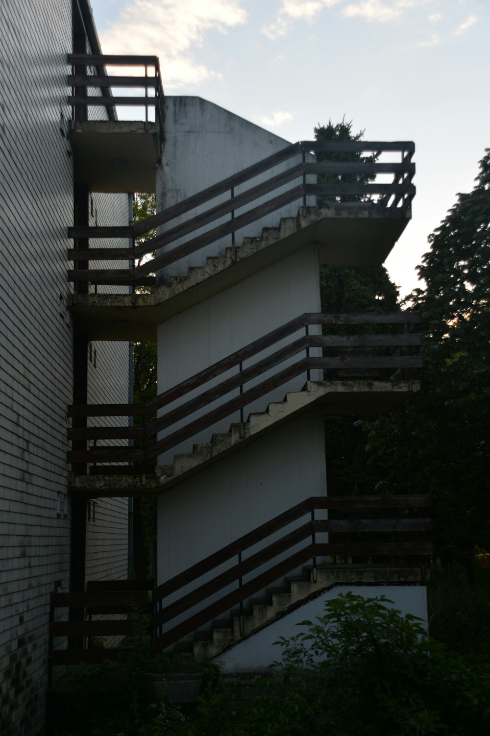 a tall building with a bunch of balconies on it