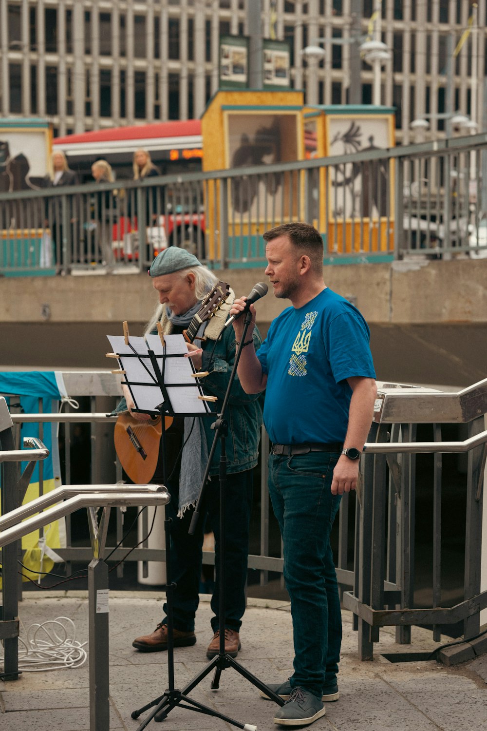 a couple of men standing next to each other