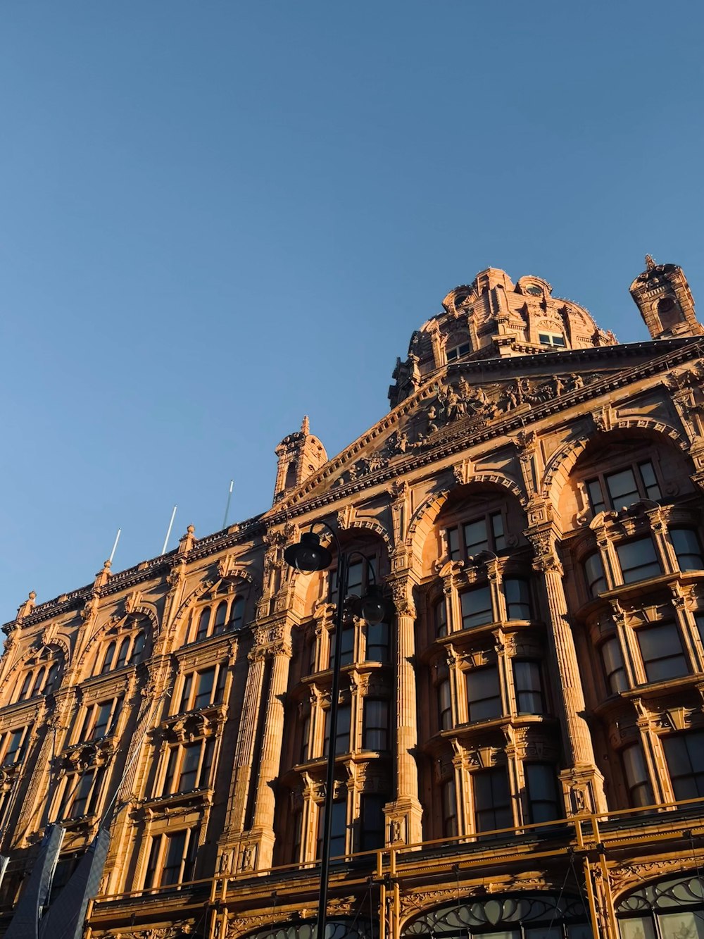 a tall building with a clock on the top of it