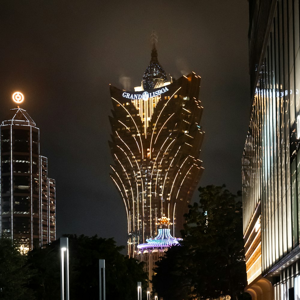 a very tall building with a clock on it's side