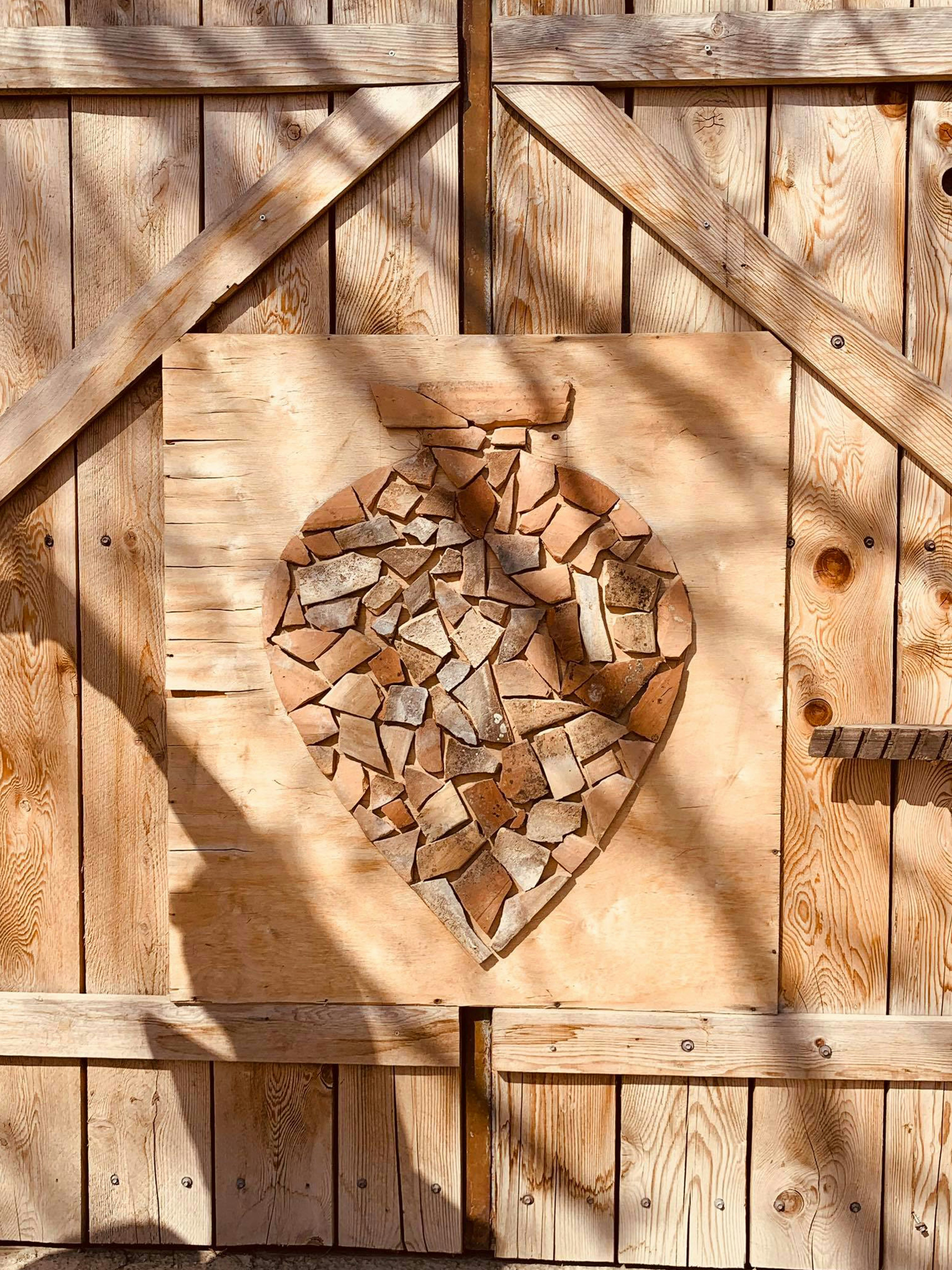 a heart made out of pieces of wood