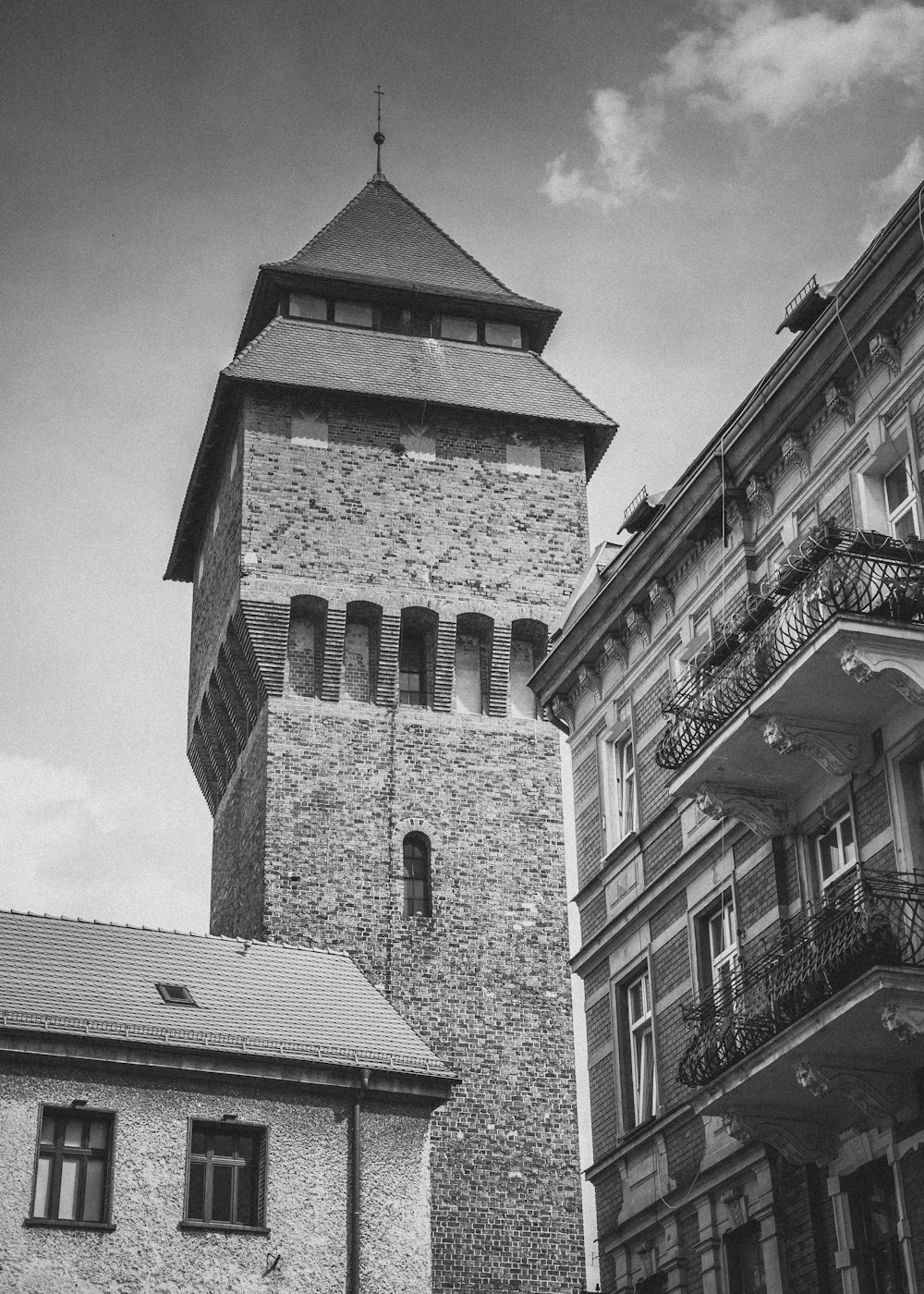 a black and white photo of a clock tower