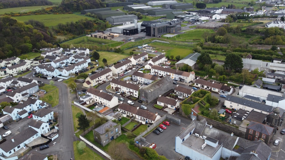 an aerial view of a town with lots of houses