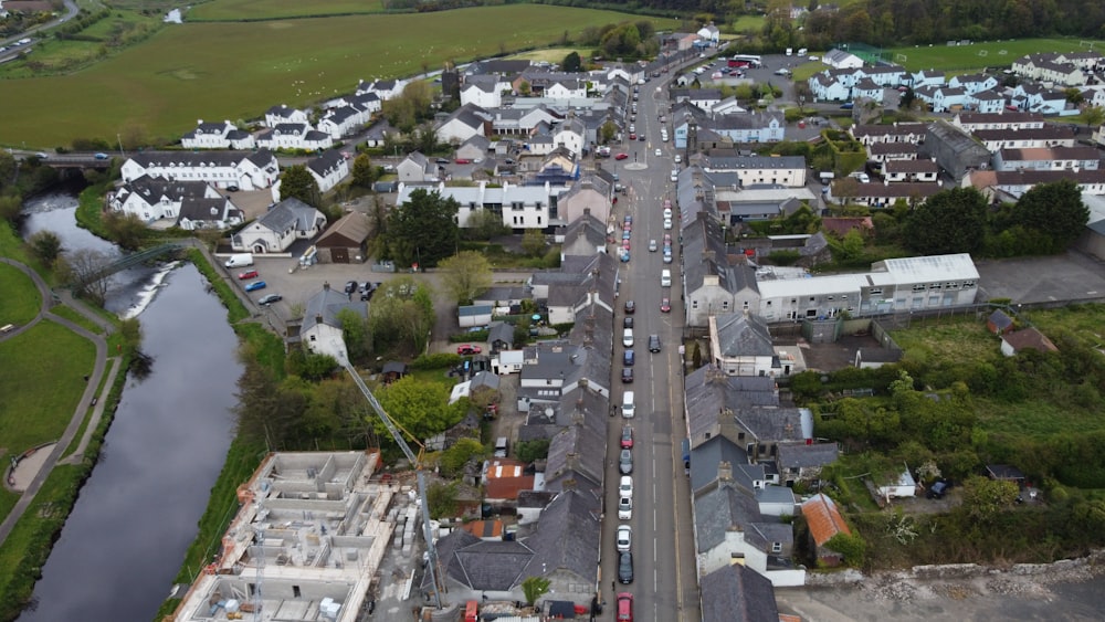 an aerial view of a town with a river running through it