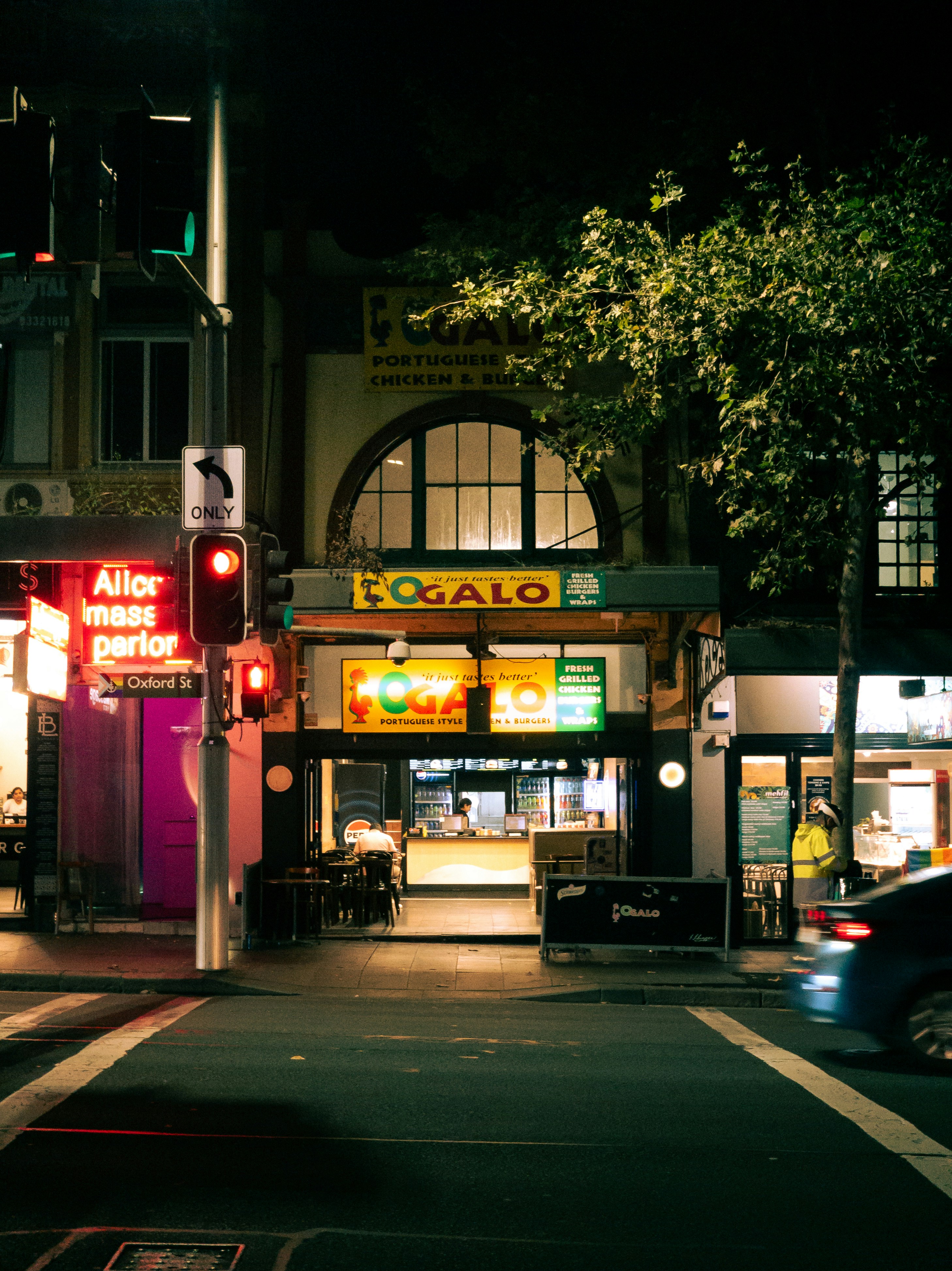 a traffic light sitting on the side of a road
