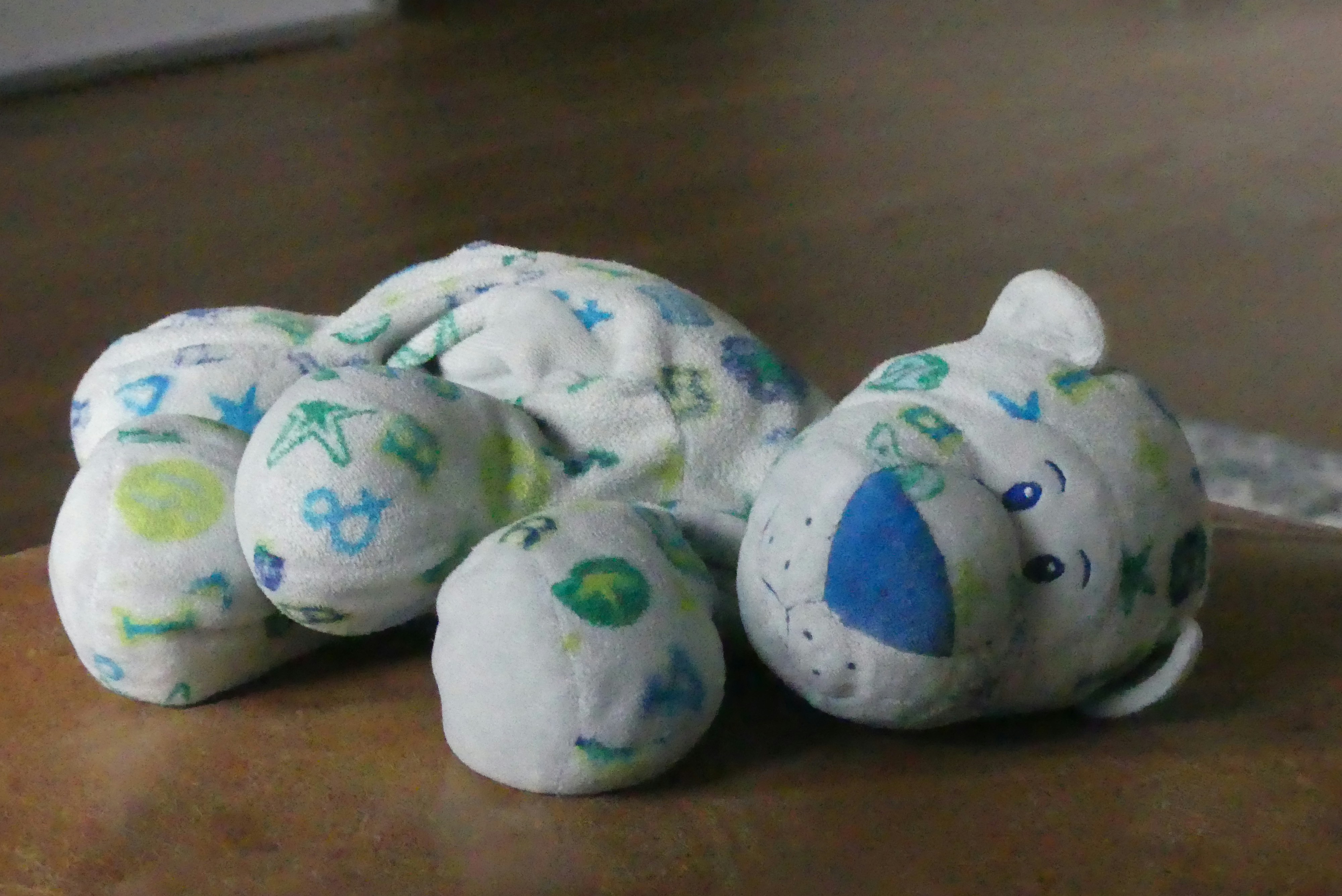 a close up of a stuffed animal on a table
