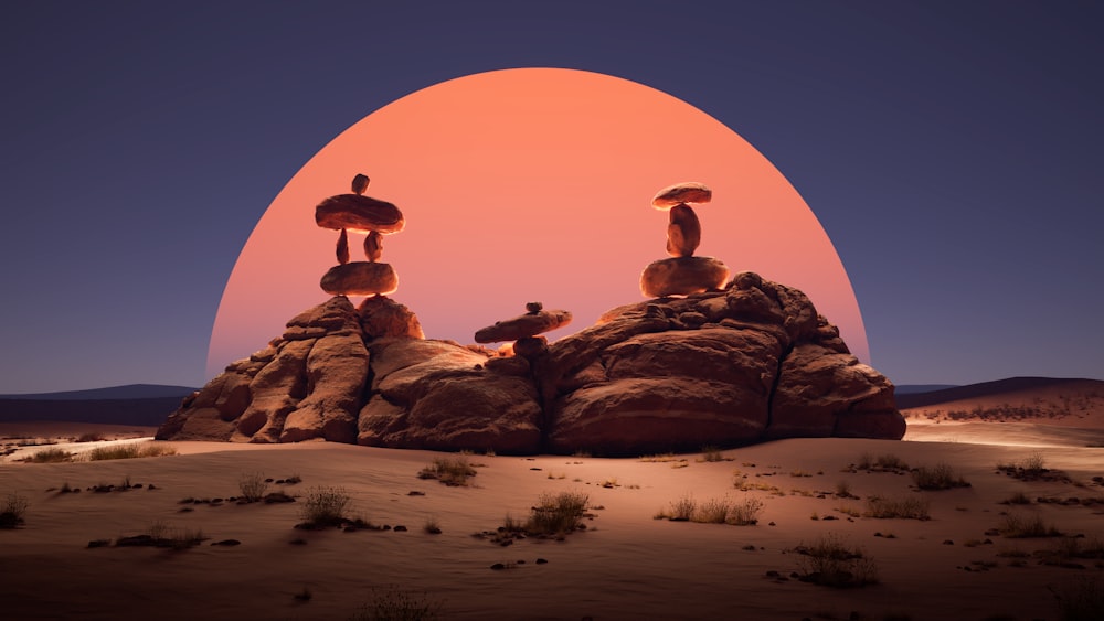 a group of rocks sitting on top of a desert