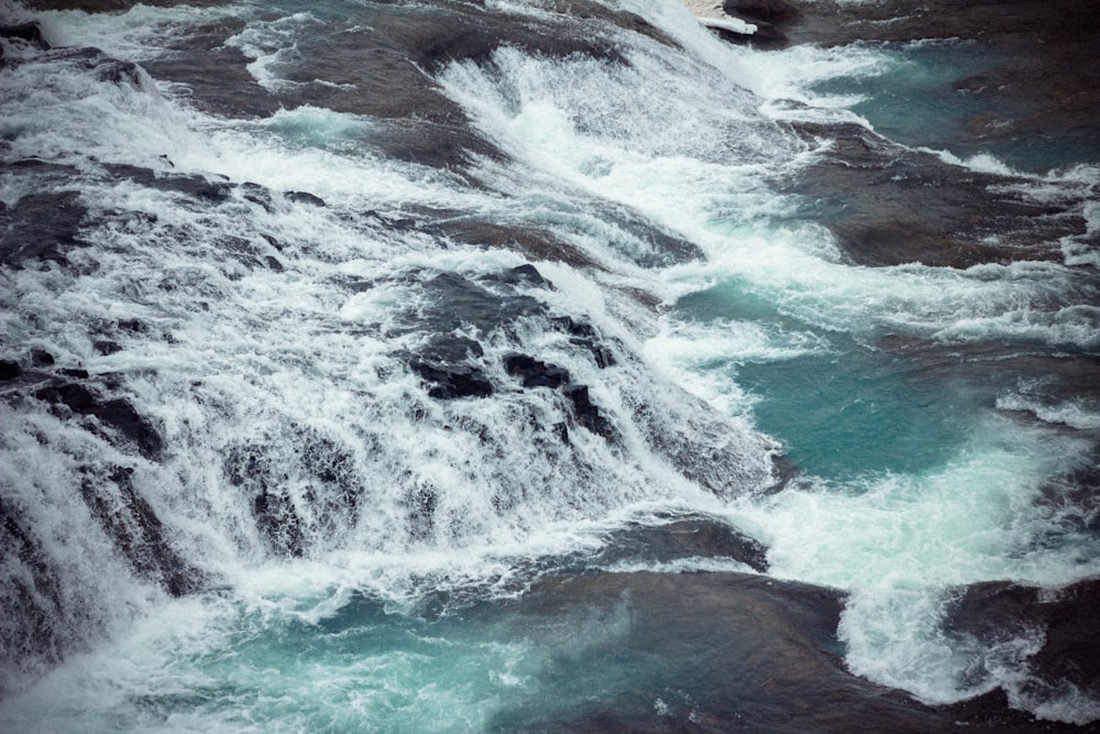 a large body of water surrounded by rocks