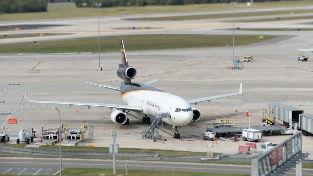 a large jetliner sitting on top of an airport tarmac