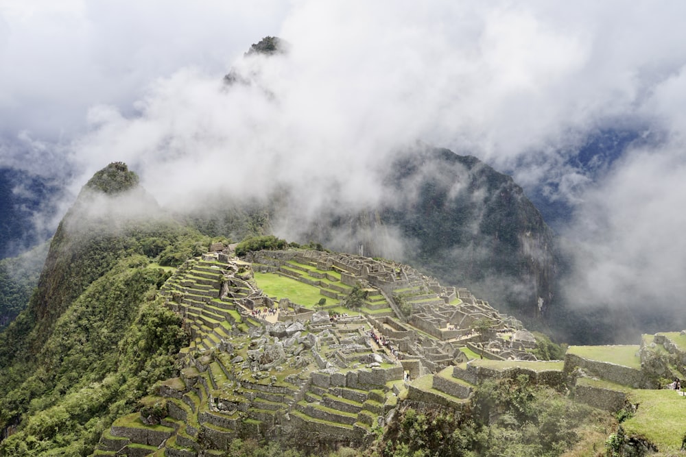 a view of a mountain range with a cloudy sky