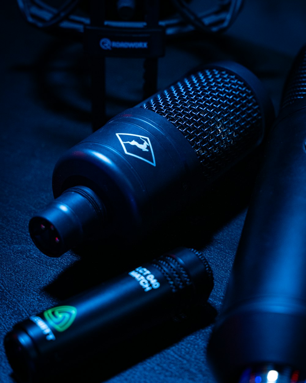 two microphones sitting next to each other on a table